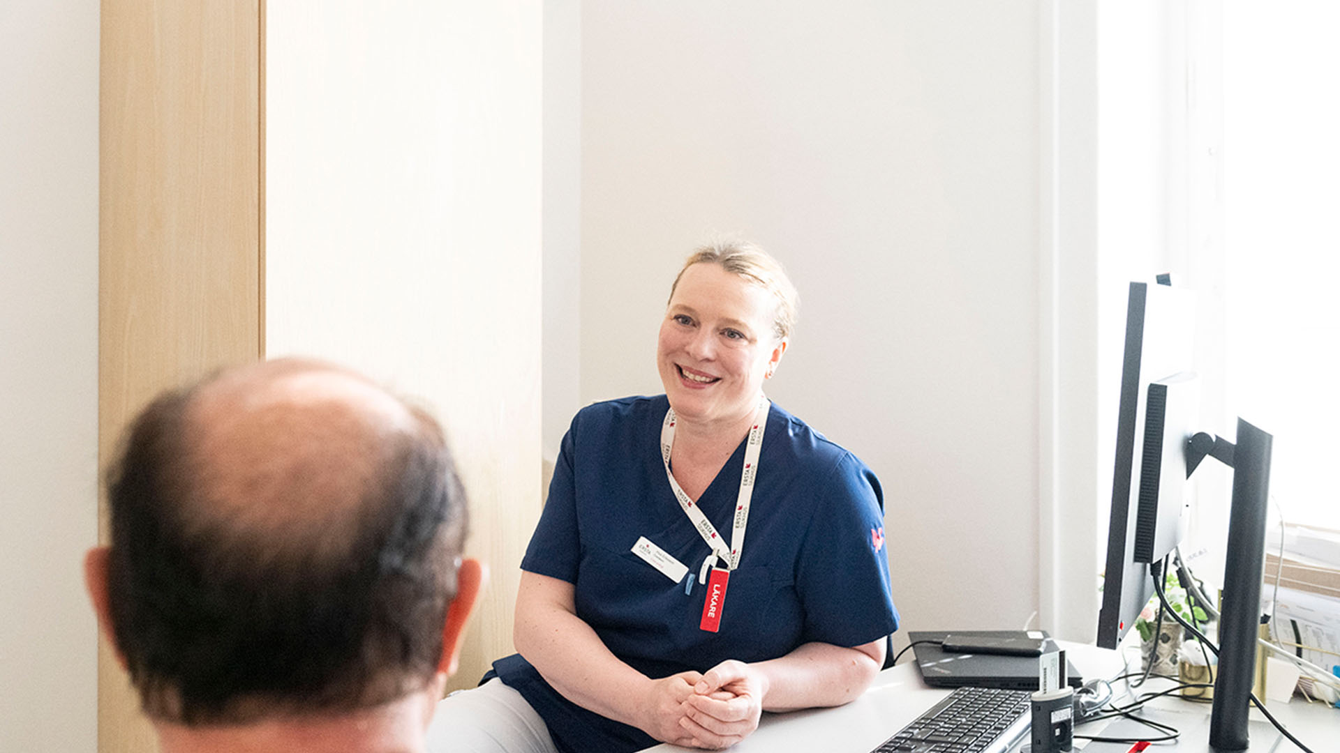 Läkare i patientmöte